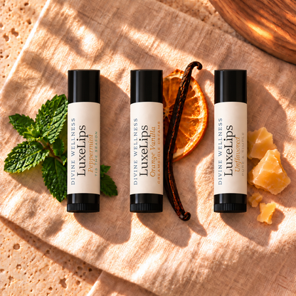 Three LuxeLips lip balms with peppermint, vanilla and orange